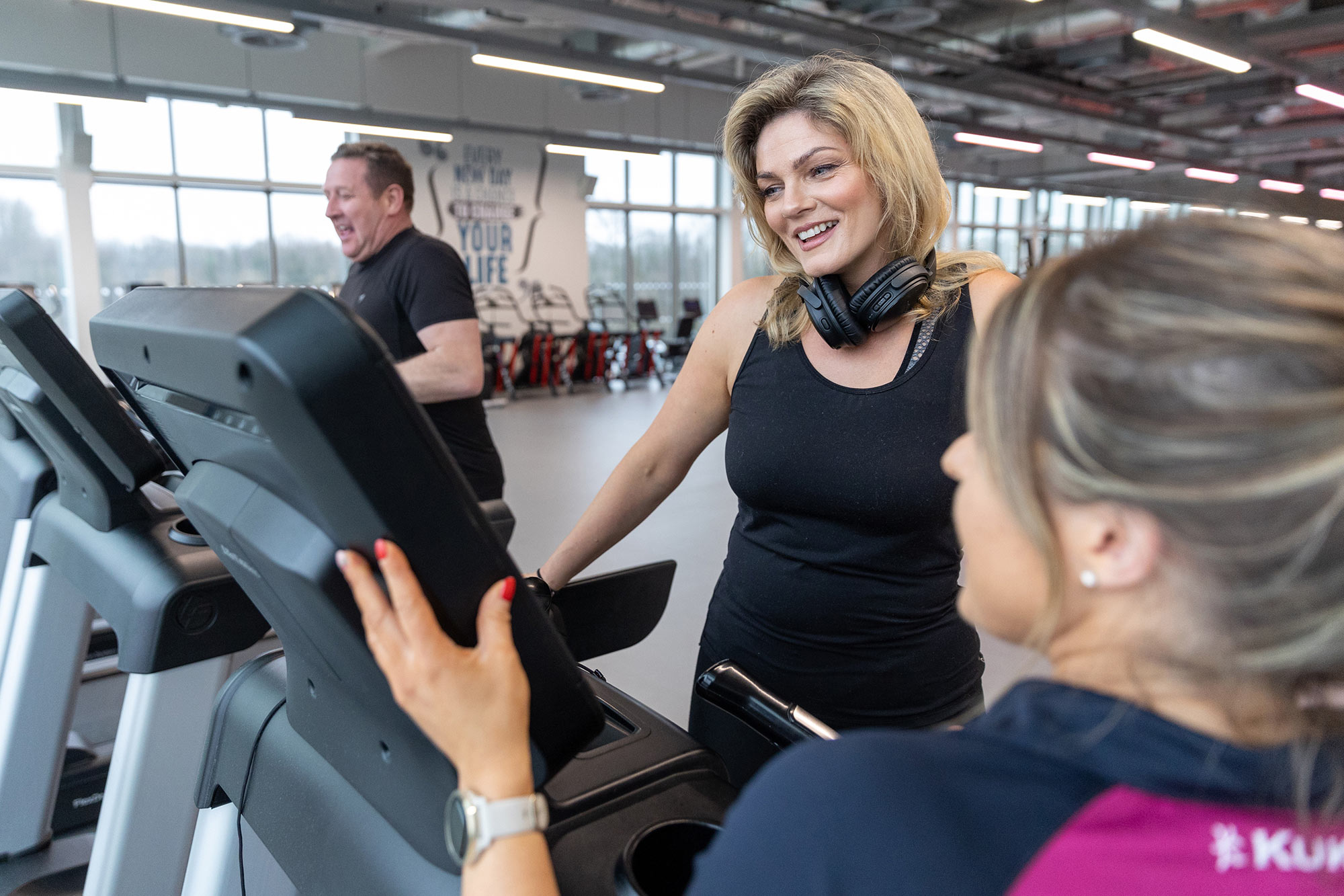 Gym goers on spin bikes